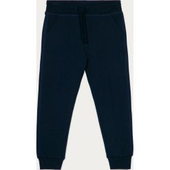 OVS - Spodnie dziecięce 104-140 cm. Niebieskie spodnie dziewczęce OVS, bez wzorów, z bawełny. Za 49,90 zł.