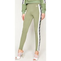 Legginsy Fila Tasya 687690. Zielone spodnie damskie Fila, s, bez wzorów. W wyprzedaży za 169,00 zł.