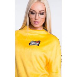 Bluza z pluszu z lampasami żółta 6562. Żółte bluzy damskie Fasardi, s, bez wzorów, bez rękawów, bez kaptura. Za 44,00 zł.