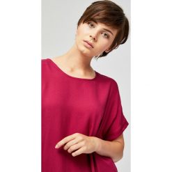 Bluzka koszulowa typu oversize. Bluzki damskie Moodo, s, bez wzorów, z koszulowym kołnierzykiem, bez rękawów. Za 19,99 zł.