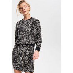 Bluza ze zwierzęcym motywem - Czarny. Czarne bluzy damskie marki Reserved, s, bez wzorów, bez rękawów, bez kaptura. Za 89,99 zł.