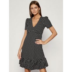 Sukienka letnia MICHAEL Michael Kors MU98XUXBMW. Czarne sukienki damskie MICHAEL Michael Kors, na lato, xl, bez wzorów, z elastanu, bez kołnierzyka, bez rękawów. W wyprzedaży za 539,00 zł.