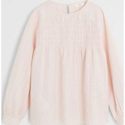 Mango Kids - Bluzka dziecięca Topo 110-164 cm. Różowe bluzki dziewczęce Mango Kids, bez wzorów, z bawełny, z okrągłym kołnierzem, z długim rękawem, długie, bez kaptura. Za 89,90 zł.
