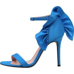 MSGM ROUCHED Sandały na obcasie blue. Niebieskie sandały damskie marki MSGM, ze skóry, na obcasie. W wyprzedaży za 452,70 zł.