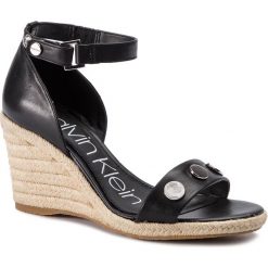 Espadryle CALVIN KLEIN - Brette E8890 Black. Czarne espadryle damskie marki Calvin Klein, z aplikacjami, ze skóry ekologicznej, bez obcasa, na obcasie. Za 679,00 zł.