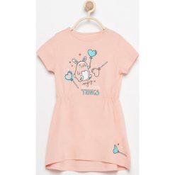 Sukienka z uroczym nadrukiem - Pomarańczo. Szare sukienki niemowlęce Reserved, z nadrukiem. W wyprzedaży za 14,99 zł.