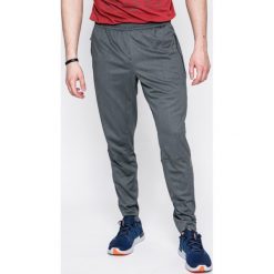 Reebok - Spodnie. Szare spodnie męskie Reebok, s, z poliesteru, sportowe. W wyprzedaży za 139,90 zł.
