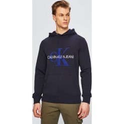 Calvin Klein Jeans - Bluza. Niebieskie bluzy męskie marki Calvin Klein Jeans, s, z nadrukiem, z bawełny, z kapturem, bez rękawów, z kapturem. Za 499,90 zł.