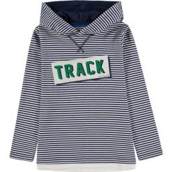 Bluza w kolorze granatowo-białym. Niebieskie bluzy niemowlęce Tom Tailor Kids, w paski, z bawełny, bez rękawów, bez kaptura. W wyprzedaży za 54,95 zł.