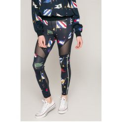 Tommy Hilfiger - Legginsy Amber. Żółte legginsy marki TOMMY HILFIGER, l, z dzianiny. W wyprzedaży za 239,90 zł.