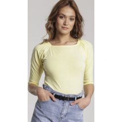 Jasnożółta Bluzka Muriena. Żółte bluzki damskie Renee, s, bez wzorów, bez kołnierzyka, bez rękawów. Za 49,99 zł.