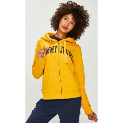 Tommy Jeans - Bluza. Żółte bluzy damskie z kieszeniami marki Tommy Jeans, s, z nadrukiem, z bawełny, z kapturem. W wyprzedaży za 319,90 zł.