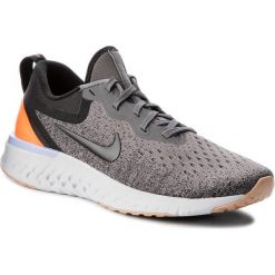 Buty NIKE - Odyssey React AO9820 004 Gunsmoke/Black/Twilight Pulse. Szare buty do biegania damskie Nike, z materiału. W wyprzedaży za 399,00 zł.