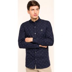 Koszula Lacoste CH0001. Białe koszule męskie Lacoste, m, bez wzorów, z bawełny, casualowe, bez kołnierzyka, bez rękawów. W wyprzedaży za 339,00 zł.