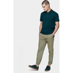 Spodnie miejskie męskie SPMC600 - khaki - Outhorn. Brązowe spodnie męskie Outhorn, m, bez wzorów. W wyprzedaży za 79,99 zł.