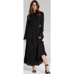 Czarna Sukienka Jimmie. Czarne sukienki damskie Renee, s, bez wzorów, eleganckie, ze stójką, bez rękawów, długie, maxi, rozkloszowane. Za 159,99 zł.