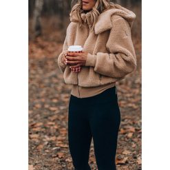 Damska bluza TELOKA. Brązowe bluzy sportowe damskie Damska bluza TELOKA, s, bez wzorów, bez rękawów, z kapturem. W wyprzedaży za 69,00 zł.