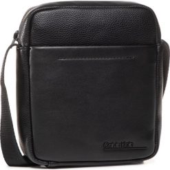 Saszetka CALVIN KLEIN - Ck Duty Mini Reporter K50K505689 BLK. Czarne torby męskie skórzane Calvin Klein, bez wzorów, ze skóry ekologicznej, młodzieżowe. Za 299,00 zł.