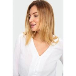 Elegancka bluzka. Bluzki damskie Greenpoint, bez wzorów, z elastanu, eleganckie, bez kołnierzyka, bez rękawów. Za 99,99 zł.