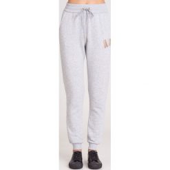 SPODNIE DRESOWE ARMANI EXCHANGE. Szare spodnie damskie Armani Exchange, xl, z dresówki, klasyczne. Za 209,50 zł.