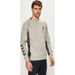 Hummel - Bluza. Szare bluzy męskie Hummel, s, z nadrukiem, z elastanu, z okrągłym kołnierzem, bez rękawów, bez kaptura. W wyprzedaży za 119,90 zł.