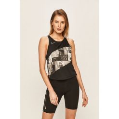Nike - Top. Czarne topy damskie Nike, s, z nadrukiem, z poliesteru, z okrągłym kołnierzem. W wyprzedaży za 109,90 zł.