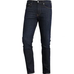 Calvin Klein Jeans 026 SLIM Jeansy Slim Fit denim. Niebieskie jeansy męskie marki Calvin Klein Jeans, z elastanu. Za 509,00 zł.
