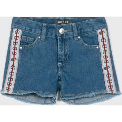 Guess Jeans - Szorty dziecięce 118-175 cm. Niebieskie spodenki dziewczęce Guess Jeans, z aplikacjami, z bawełny, casualowe. W wyprzedaży za 139,90 zł.