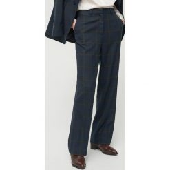 Eleganckie spodnie w kratę - Wielobarwny. Spodnie damskie Reserved. Za 179,99 zł.