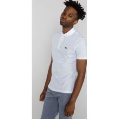 Lacoste Polo Koszulka Biały. Białe podkoszulki męskie Lacoste, m, bez wzorów, z bawełny, bez rękawów. Za 423,95 zł.