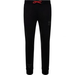 Spodnie dresowe Guess U94A08 K6XF0. Czarne jeansy męskie Guess, m, z aplikacjami. W wyprzedaży za 199,00 zł.