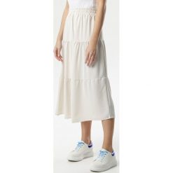 Kremowa Spódnica Mellie. Brązowe spódniczki damskie Born2be, s, bez wzorów, midi, rozkloszowane. Za 89,99 zł.