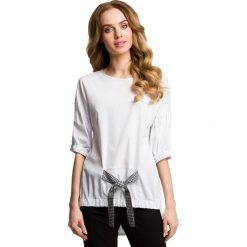 CAMELIA Bluzka z czarną kokardą. Czarne bluzki damskie oversize marki Moe, s, w kratkę, z jeansu, eleganckie, z kokardą, z krótkim rękawem. Za 119,00 zł.