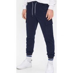 Joggery z kieszeniami - Granatowy. Niebieskie spodnie męskie House, s, bez wzorów. Za 129,99 zł.