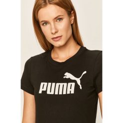 Puma - T-shirt. Czarne bluzki damskie Puma, s, z nadrukiem, z elastanu, casualowe, z okrągłym kołnierzem, z krótkim rękawem. W wyprzedaży za 59,90 zł.