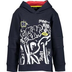 Bluza w kolorze granatowo-białym. Niebieskie bluzy niemowlęce BLUE SEVEN Kids, z nadrukiem, z bawełny, bez rękawów, bez kaptura. W wyprzedaży za 42,95 zł.