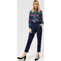Spodnie joggersy. Niebieskie spodnie damskie Moodo, s, bez wzorów, z elastanu. Za 49,99 zł.