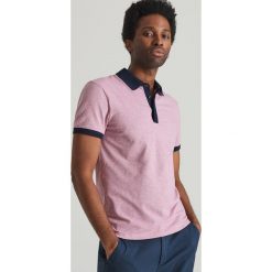 Koszula polo slim fit - Różowy. Różowe koszule męskie Reserved, s, bez wzorów, polo, bez rękawów. Za 79,99 zł.