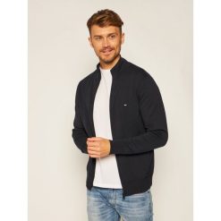 Sweter TOMMY HILFIGER Zip Through MW0MW10864. Niebieskie swetry męskie TOMMY HILFIGER, s, bez wzorów, klasyczne, z klasycznym kołnierzykiem, bez kaptura. Za 579,00 zł.