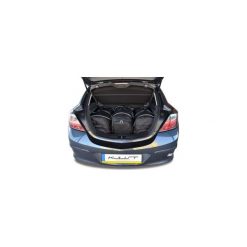OPEL ASTRA GTC, 2004-2013 TORBY DO BAGAŻNIKA 3 SZT KJUST - 7031110. Torby podróżne KJUST, bez wzorów, z kauczuku, klasyczne. Za 859,00 zł.