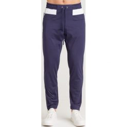 SPODNIE Trussardi Jeans. Niebieskie spodnie męskie xxl, z jeansu. Za 235,00 zł.