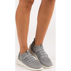 ALIVIA tekstylne wsuwane obuwie sportowe szare. Szare buty sportowe damskie marki KYLIE, bez wzorów, bez zapięcia. Za 89,90 zł.