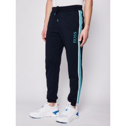 Spodnie dresowe Boss Authentic 50424796. Niebieskie jeansy męskie Boss, xl, bez wzorów. Za 299,00 zł.