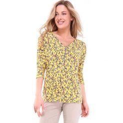 Koszulka "Toflor" w kolorze żółtym. Żółte koszulki damskie Multiples grandes tailles, bez wzorów, klasyczne, bez kołnierzyka. W wyprzedaży za 64,95 zł.