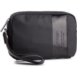 Saszetka CALVIN KLEIN - Elevated Compact Case K50K504448 001. Czarne torby męskie skórzane marki Calvin Klein, bez wzorów, ze skóry ekologicznej, młodzieżowe. Za 299,00 zł.