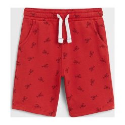 Mango Kids - Szorty dziecięce Tropic 110-164 cm. Czerwone spodenki chłopięce Mango Kids, bez wzorów, z bawełny, casualowe. W wyprzedaży za 47,90 zł.