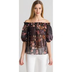 BLUZKA EMPORIO ARMANI. Czarne bluzki damskie Emporio Armani, bez wzorów, z bawełny, z włoskim kołnierzykiem, bez rękawów. Za 444,50 zł.