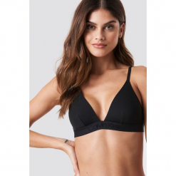 Calvin Klein Biustonosz trójkątny Tonal Logo - Black. Czarne biustonosze z fiszbinami Calvin Klein, z haftami, z materiału. Za 161,95 zł.