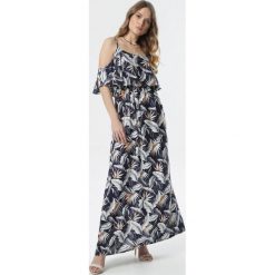 Granatowa Sukienka Nysathyia. Niebieskie sukienki damskie Born2be, na lato, s, bez wzorów, z tkaniny, bez kołnierzyka, bez rękawów, maxi, rozkloszowane. Za 79,99 zł.