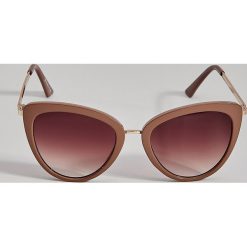 Okulary przeciwsłoneczne cat eye - Fioletowy. Fioletowe okulary przeciwsłoneczne damskie marki Mohito. Za 49,99 zł.